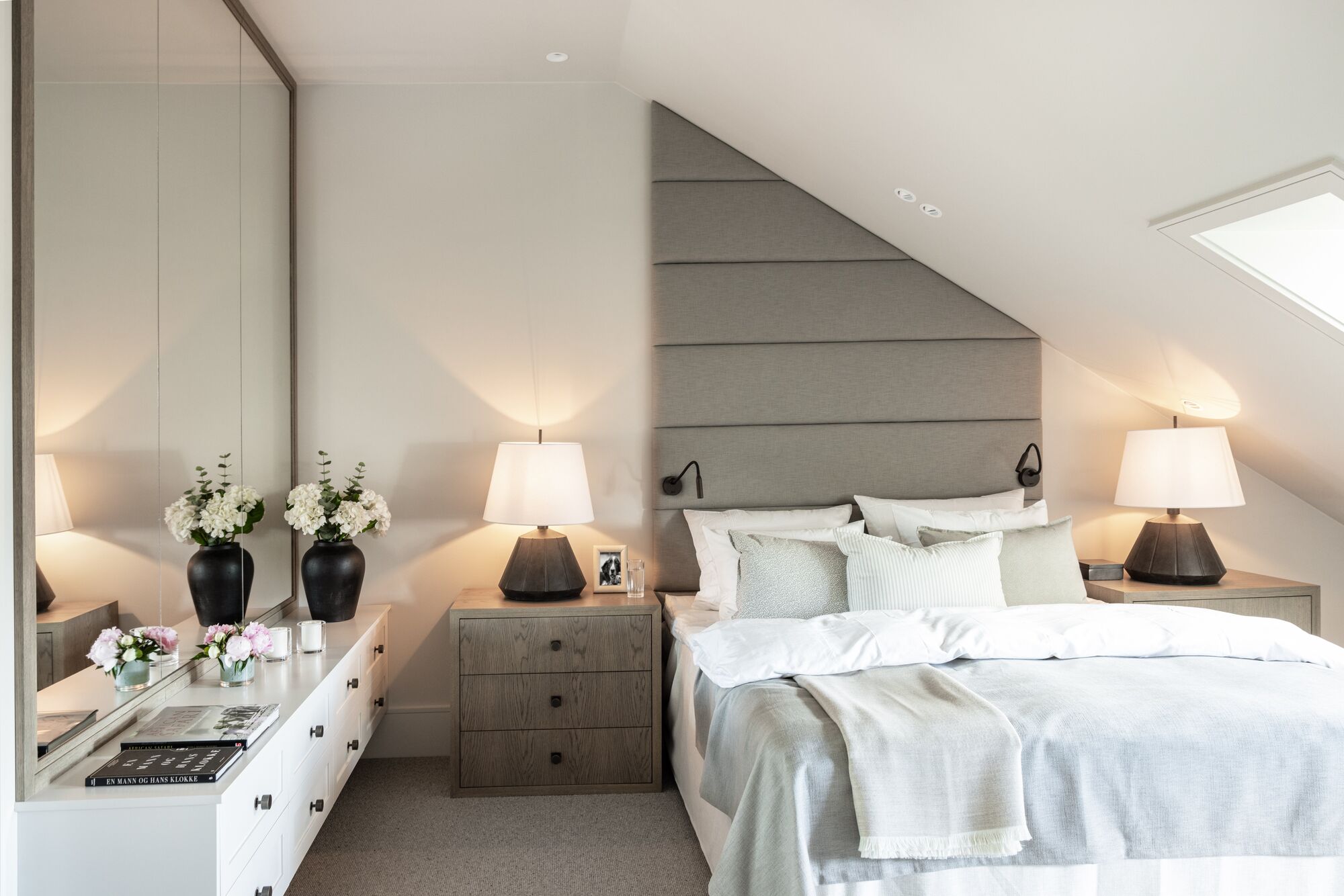 Bedroom with an upholstered headboard