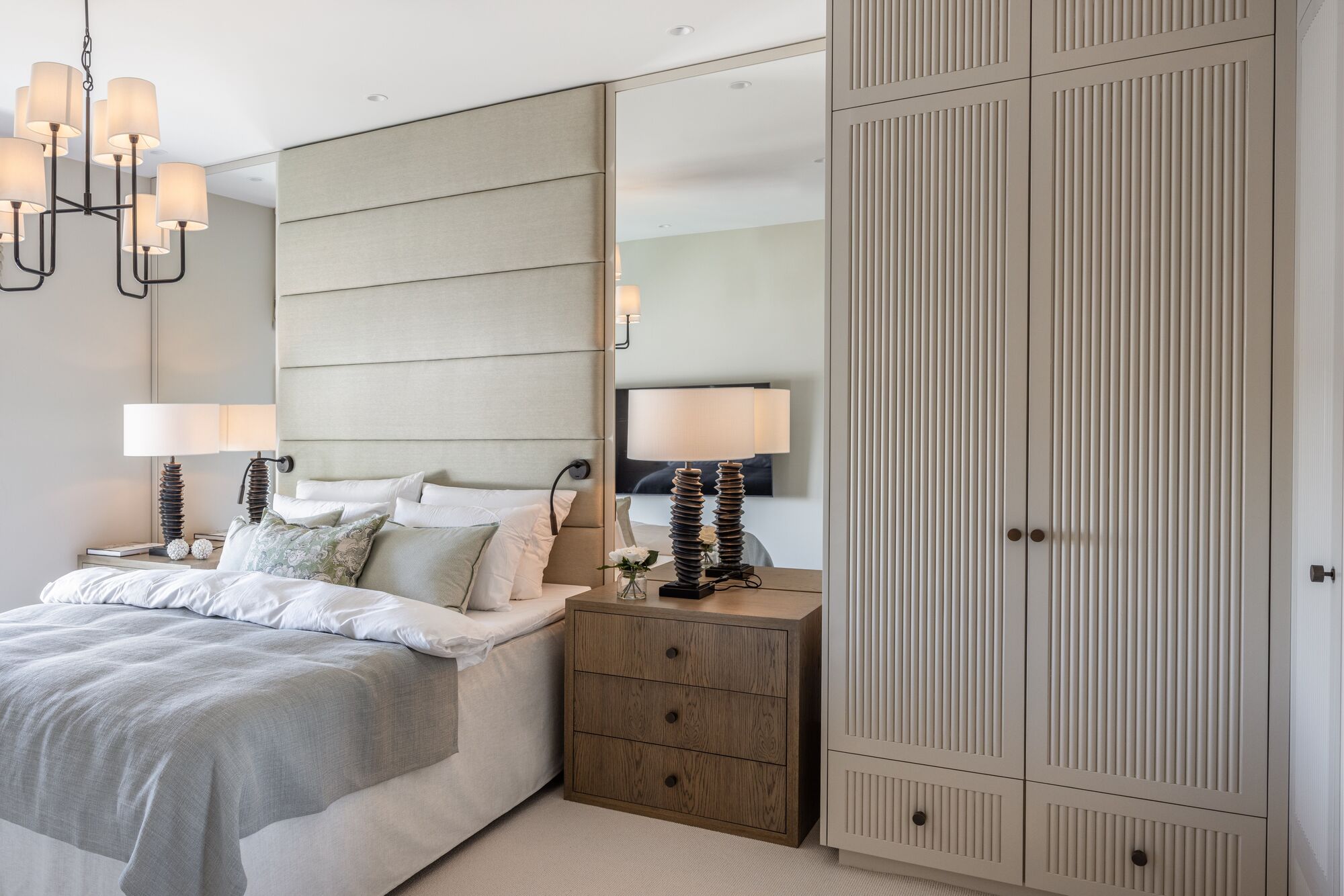 Bedroom with fluted wardrobe doors