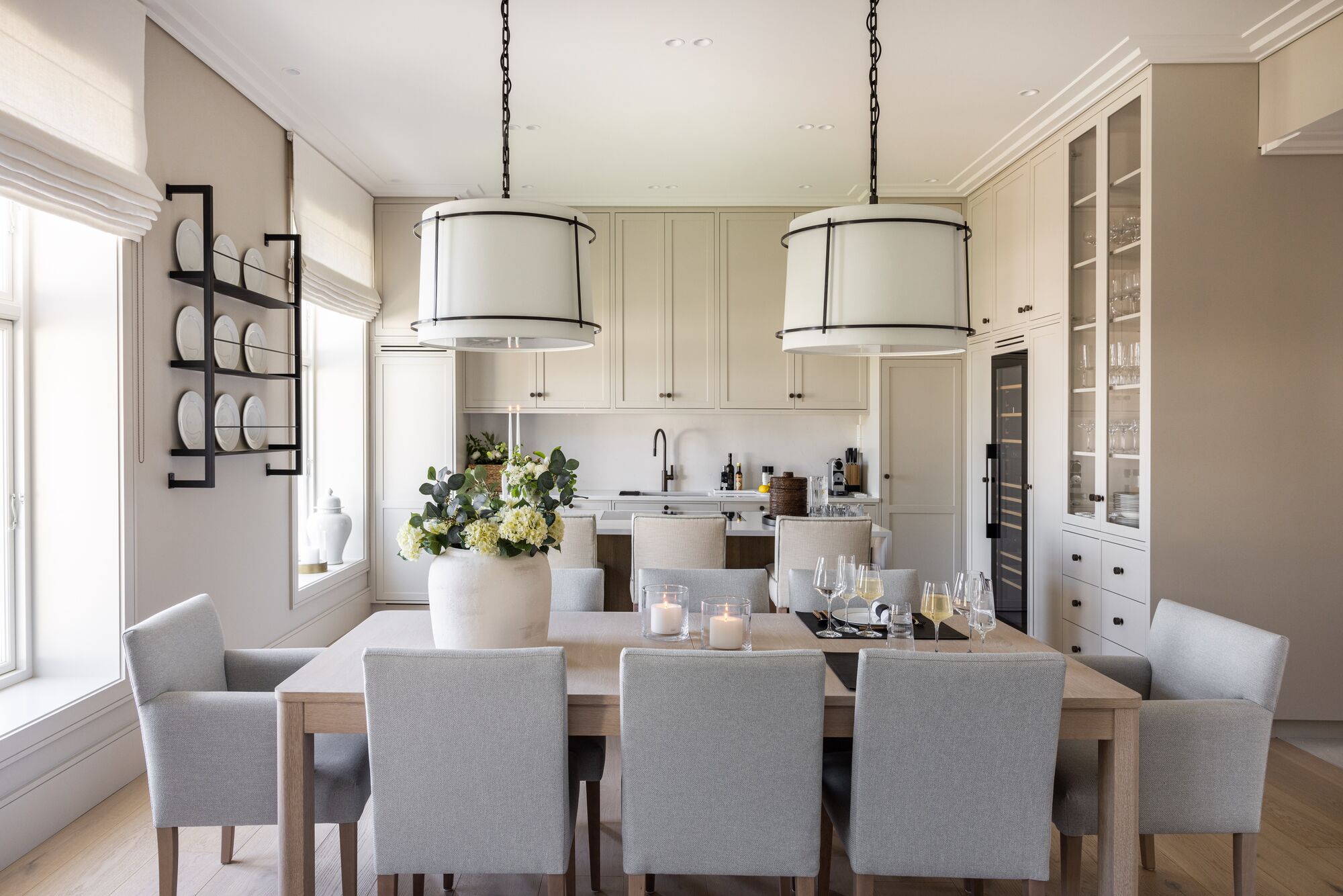 Dining room with paired pendant lights