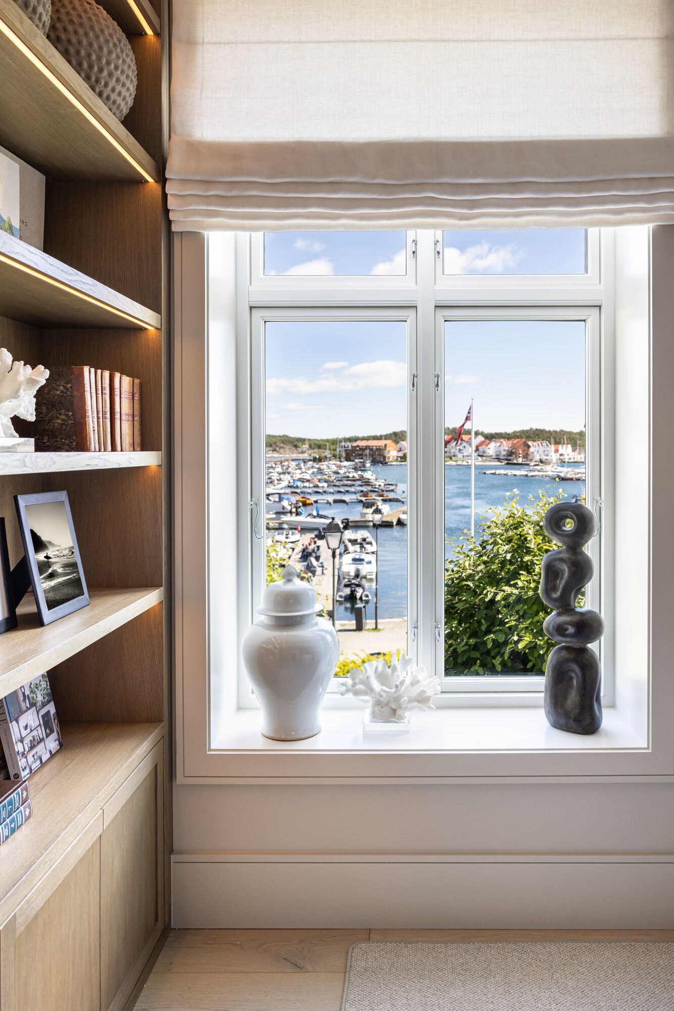 A deep window reveal looking over the harbour
